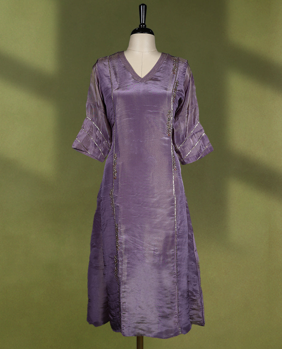 Pastel Purple coloured stylish kurthi without slit, featuring a V neck design adorned with intricate cut bead, sequin, and thread work, for women