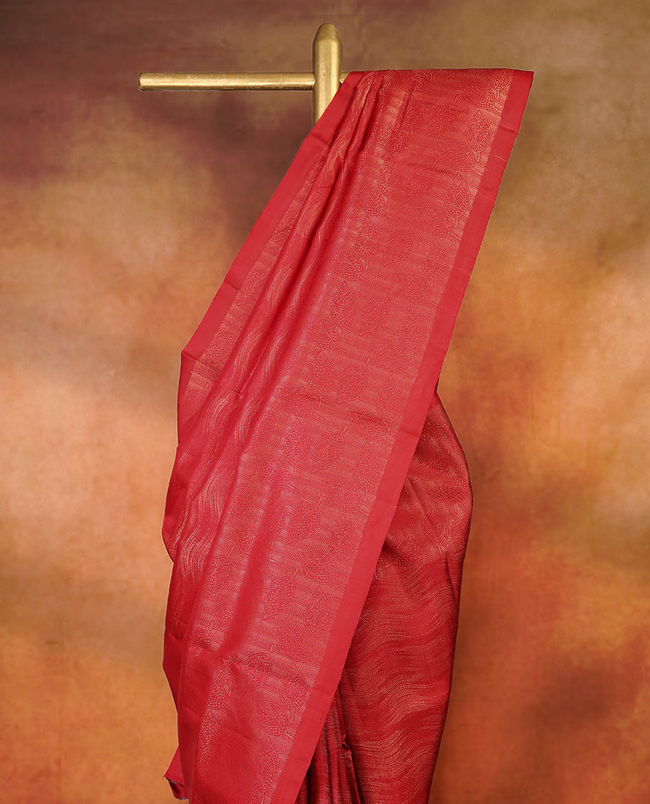 Deep Red Colour pure Mayuri silk saree featuring intricate gold Zari woven patterns across the body, highlighted with a rich woven border, with matching blouse