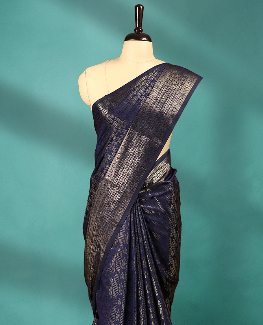 Navy Blue Art Soft Silk Saree showcases intricate silver zari work on the body and border, paired with a matching blouse