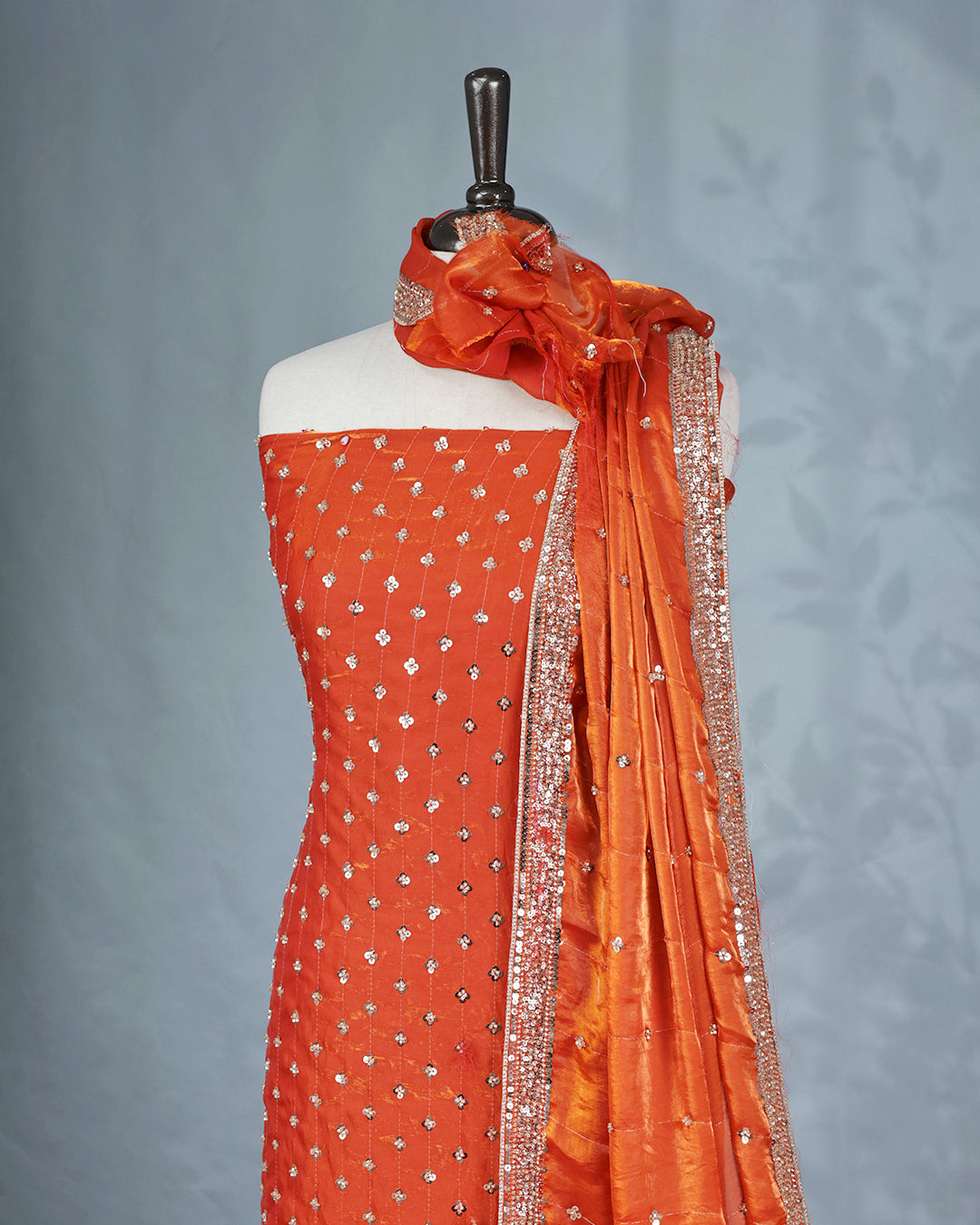 Rust Orange colour salwar material with Cut beats & sequins work on body, Matching Bottom & dupatta.