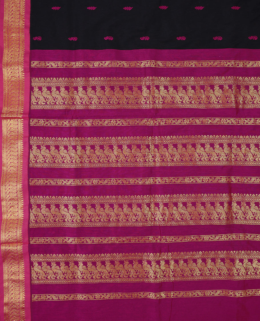 Pure Black colour mixed Kalyani cotton saree featuring Magenta zari motifs throughout the body, paired with a Magenta colour traditional border and pallu, with matching blouse