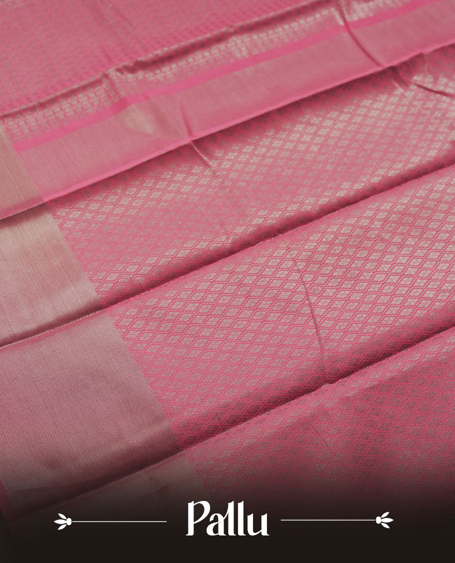 Dusty pink colour semi silk saree featuring neem zari Brocade geometric Pattern all over the body, complemented by a Self Colour woven border with detailing, Pallu & blouse.
