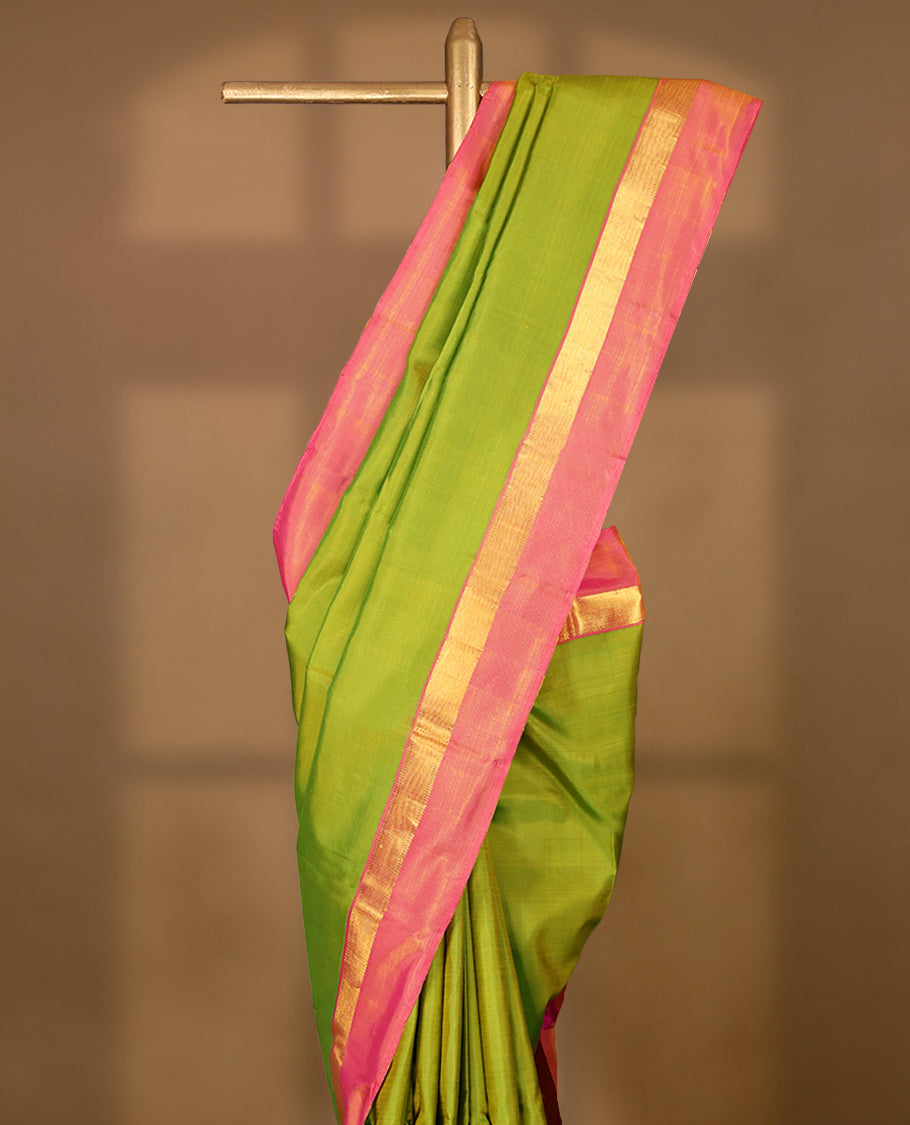 Lemon Green Colour Pure Kancheepuram Traditional Silk Saree having Plain Body with Contrast Border and Blouse