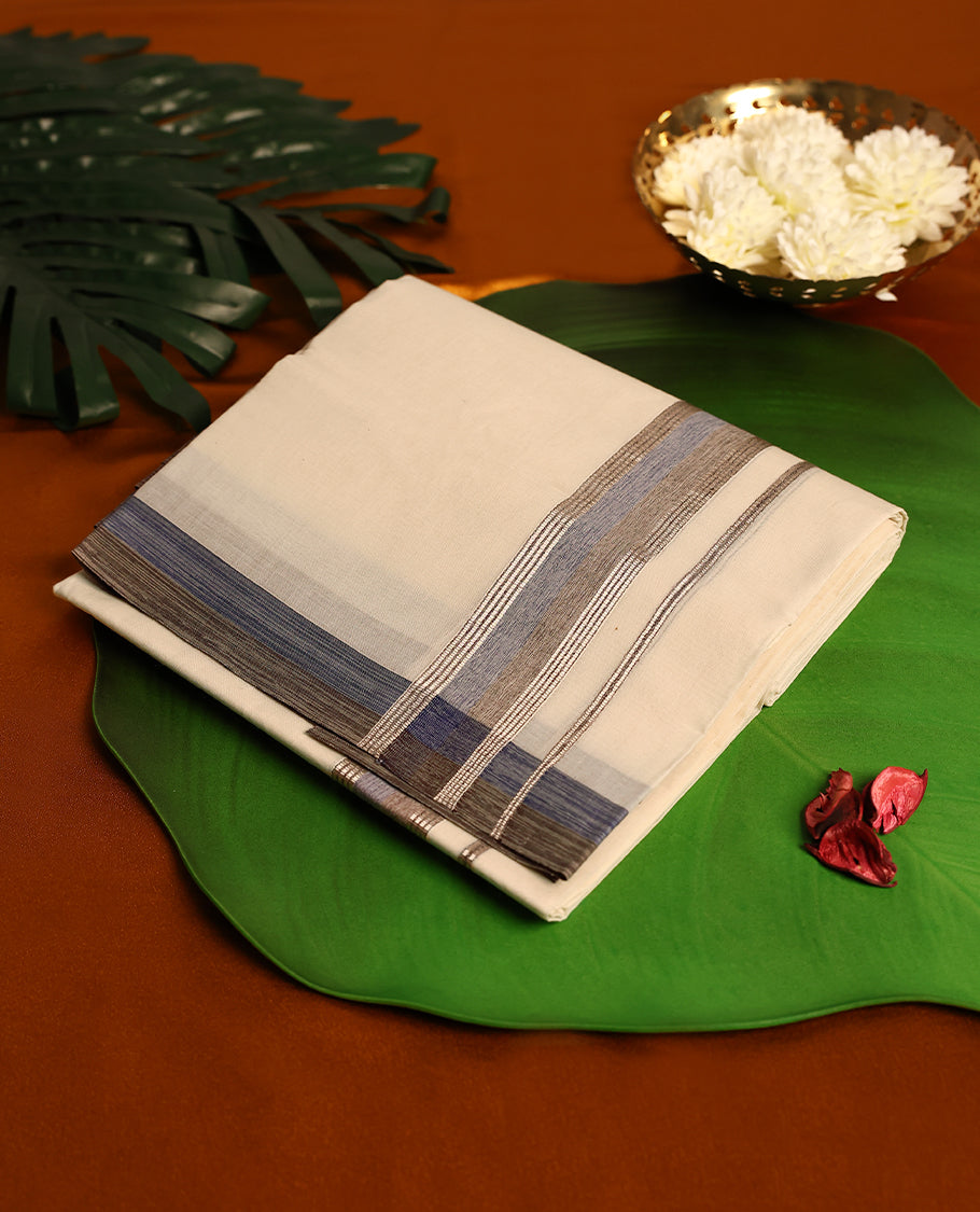 Light ivory Colour cotton double dhoti with 1.5 Inch Pastel Blue & Black kara, crafted for traditional elegance & comfort, for men.