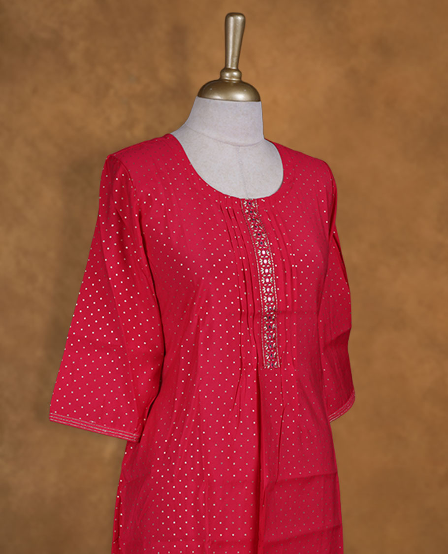 Rose pink colour kurti from TWARA, detailed with gleaming gold polka dots, featuring a scoop neckline with pintucked yoke and embellished placket, finished with relaxed 3/4th sleeves.