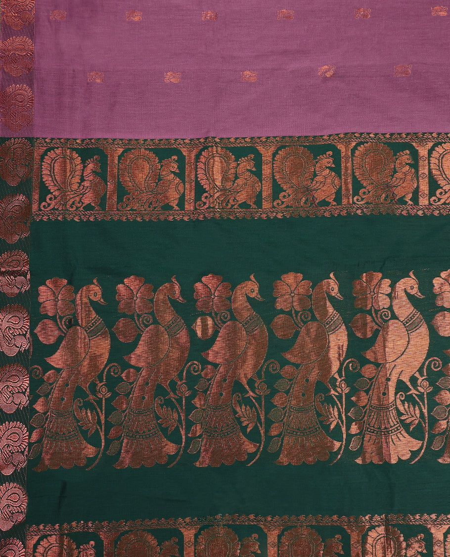 Lavender pink and Dark Green Kalyani cotton saree featuring intricately woven golden peacock and paisley motifs across the border and pallu, highlighted with a zari finish, and paired with a matching blouse.
