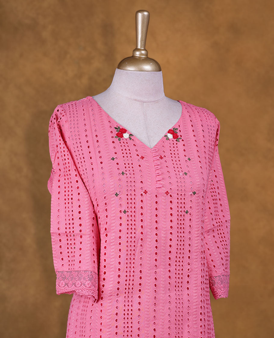 Pink colour kurti with self colour colour thread pattern across the body, knee length design, styled with a V neckline and a sleeve .