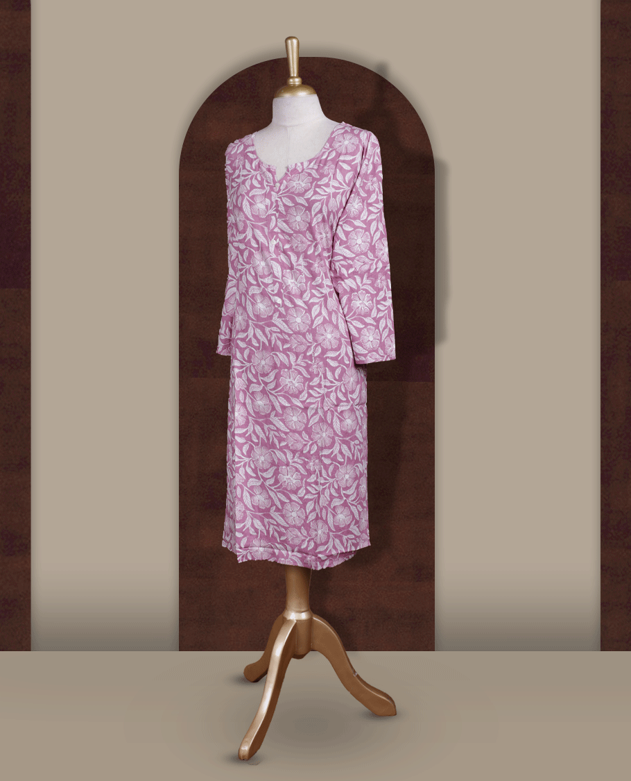 Mauve colour kurthi adorned with delicate white floral prints & styled with a round V notch neckline and comfortable 3/4th sleeves.
