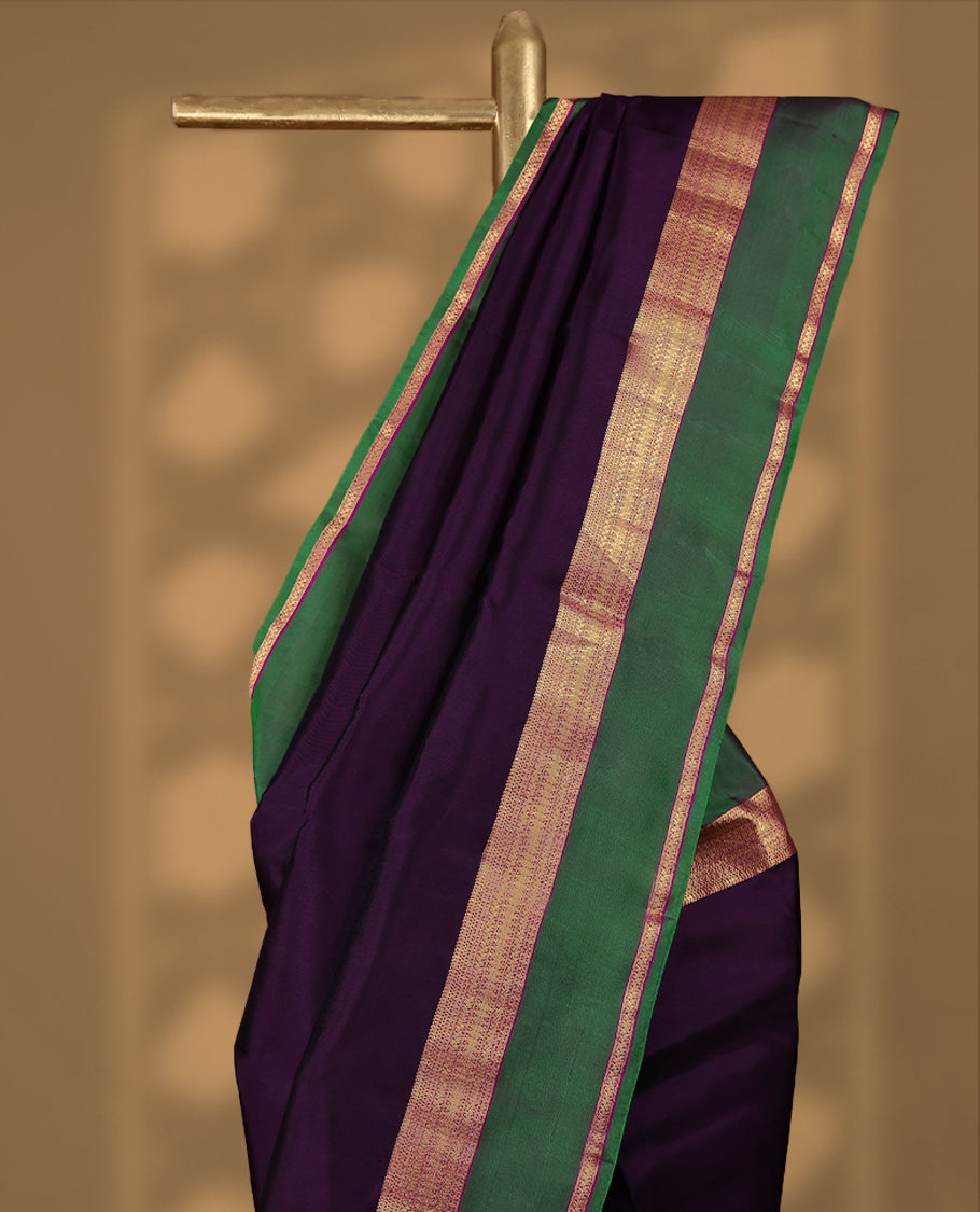 Dark Grape Colour Vasundhara Silk Saree having Plain Body with Green Colour Border and Light Grape Blouse
