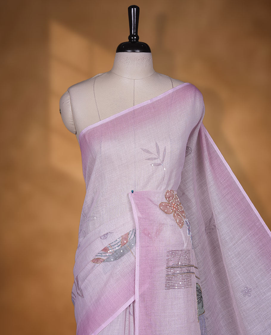 Light Pink colour linen saree featuring Pink colour fade border with floral beats pattern around floral print across body without border, pallu and matching blouse piece.