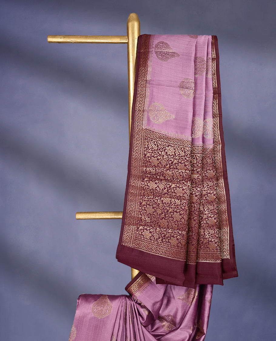 Onion Colour Pure Banaras Soft Silk Saree adorned with traditional antique zari motifs, paired with a hand dyed Dark Maroon antique style border and a matching blouse.