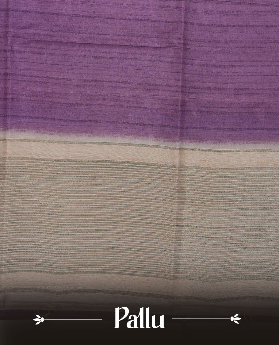 Purple colour semi tusser silk saree featuring contrast cream colour London bridge printed pattern border and paired with matching blouse.