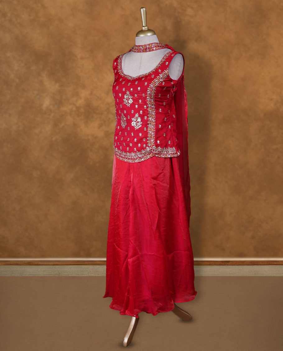 Red colour sharara set adorned with intricate silver embroidery and sequins work & The fitted embellished top pairs beautifully with the flared bottoms and matching dupatta.
