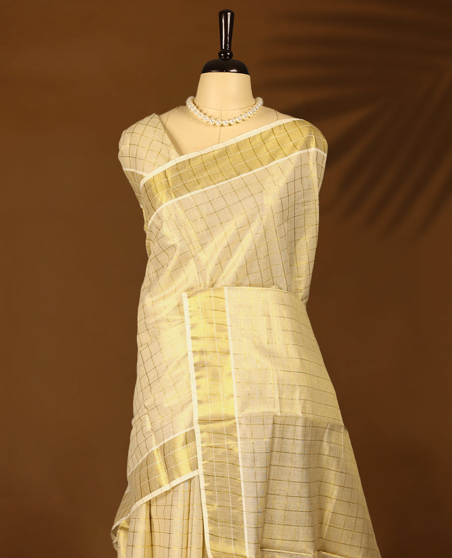 Kerala Tissue saree with fine golden Checks and Golden border with Matching Blouse
