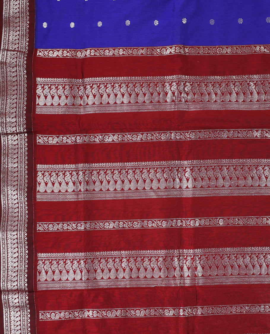 Blue colour mixed Kalyani cotton saree featuring Silver zari flower motifs throughout the body, paired with a Maroon colour traditional border and pallu, with matching blouse