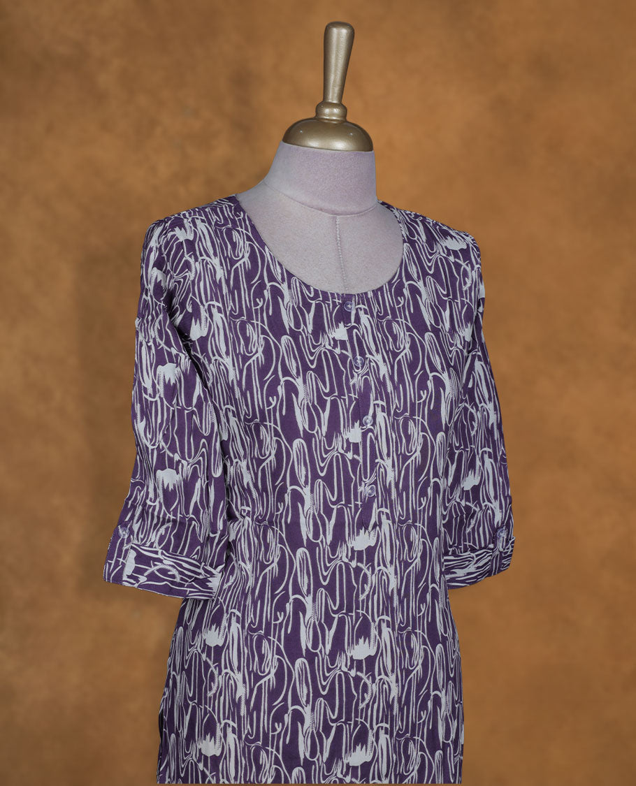 Violet and white colour kurti with White floral prints, knee length design, styled with a round neckline and a sleeve .