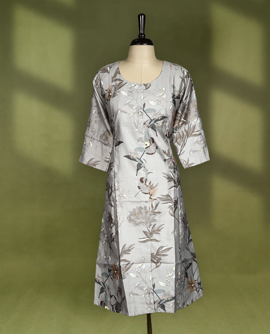 Elegant light grey straight cut kurti featuring soft floral digital prints in earthy tones, designed with a round neckline, subtle front buttons, and 3/4th sleeves, perfect for casual or workwear styling