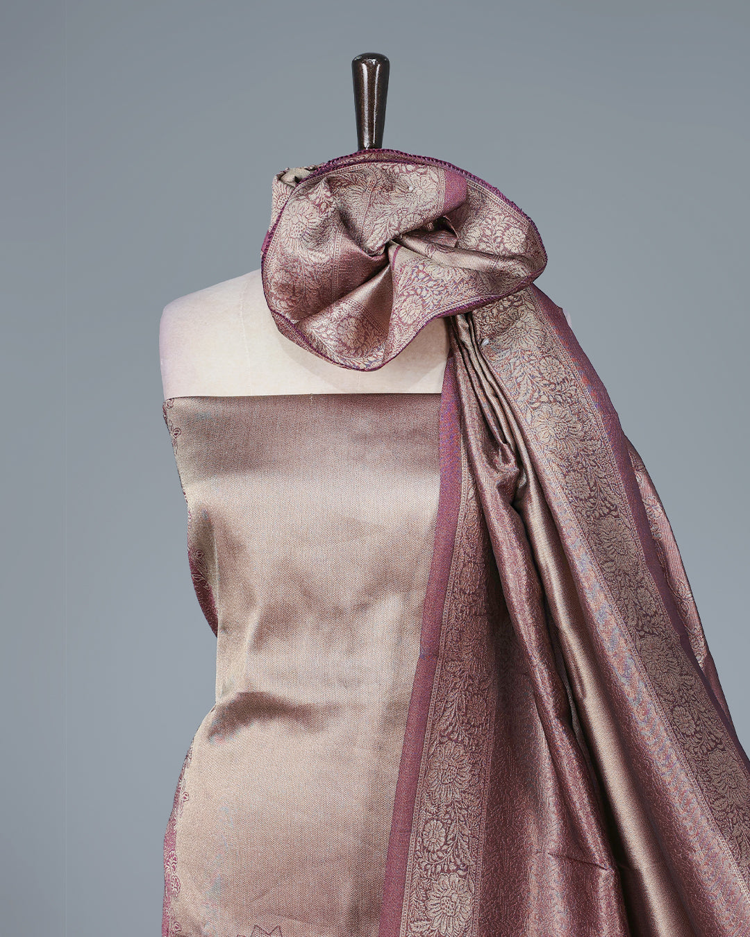 Purple Colour Tissue Salwar Material featuring elegant lotus floral motifs on the front panel, paired with a matching bottom and dupatta for a timeless, sophisticated look.