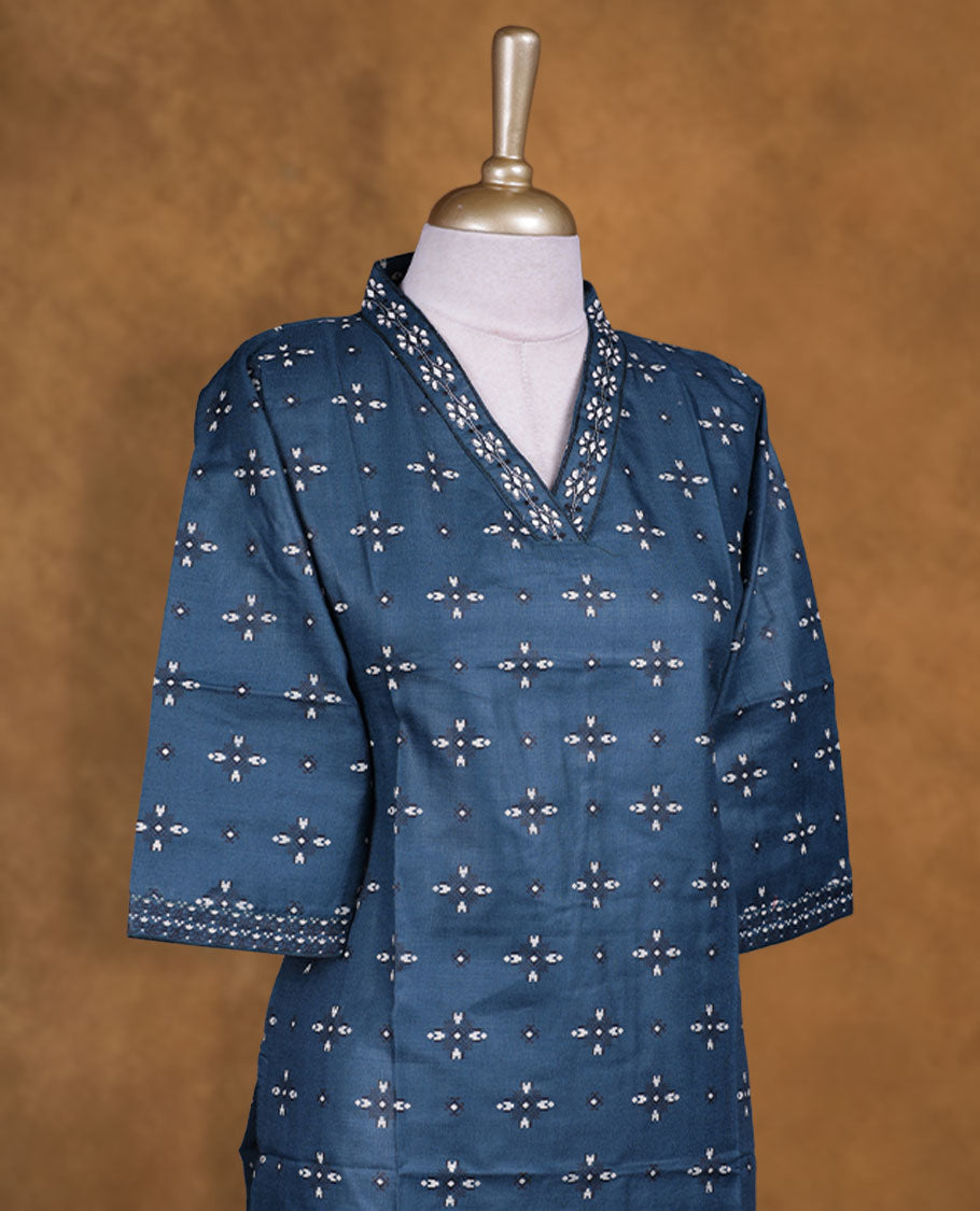 Dark green colour kurti with styled with a thread pattern around neckline, print on body knee length design, and a sleeve .