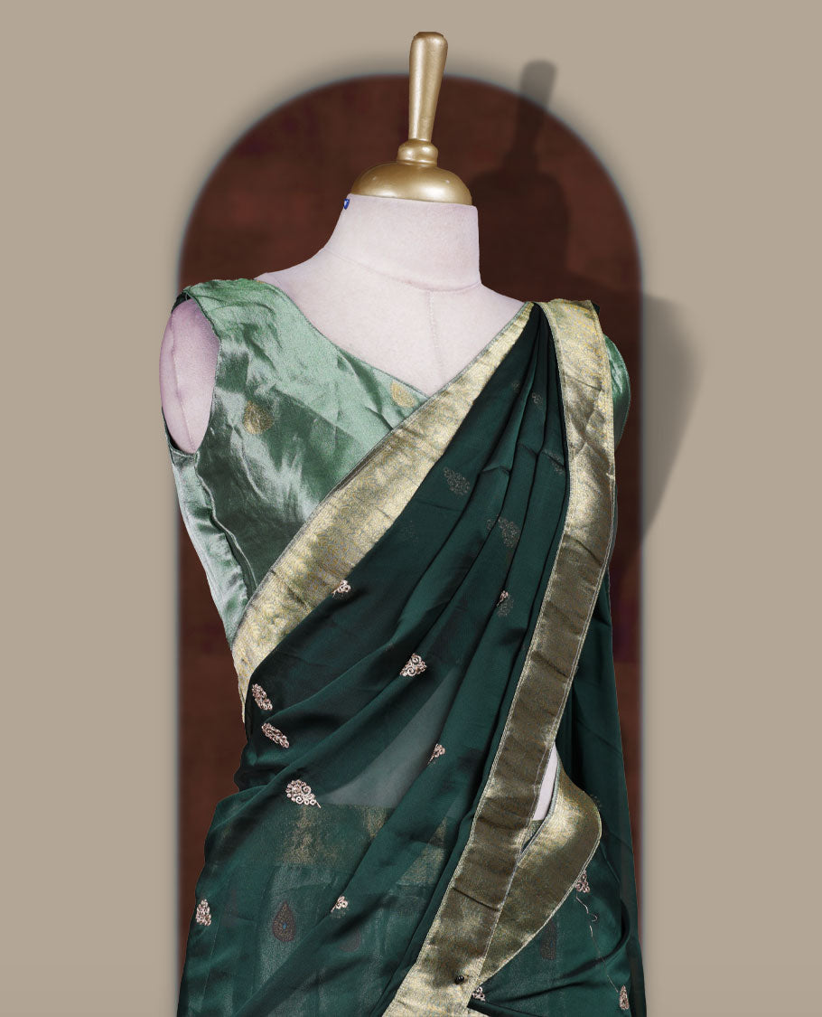 Light green colour Dhavani set featuring a Green colour skirt with contrast Gold colour border with rich gold zari pattern, paired with a Matching dupatta detailed with Gold motifs