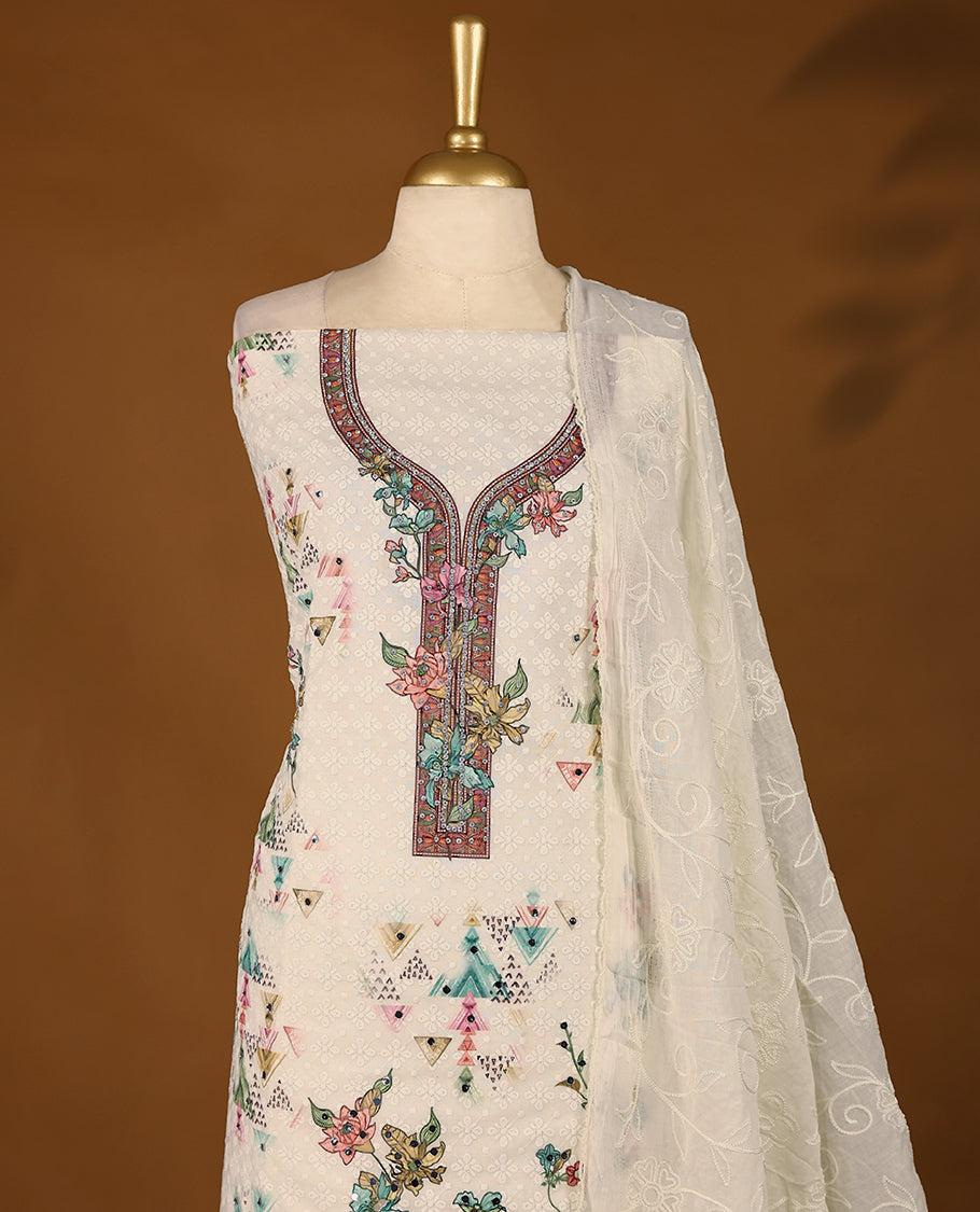 Off-white threadwork top with multi-colour prints and red border, paired with a bottom and an embroidered dupatta.