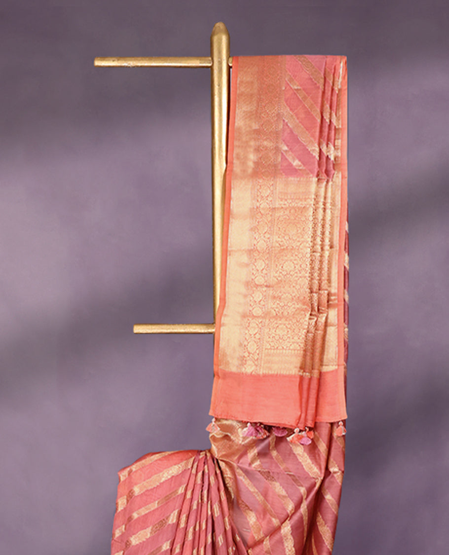 Onion Pink colour pure Banarasi Chanderi cotton, beautifully enhanced with hand-brushed colour and traditional antique zari Aada Design across the body, paired with traditional border and a matching blouse.