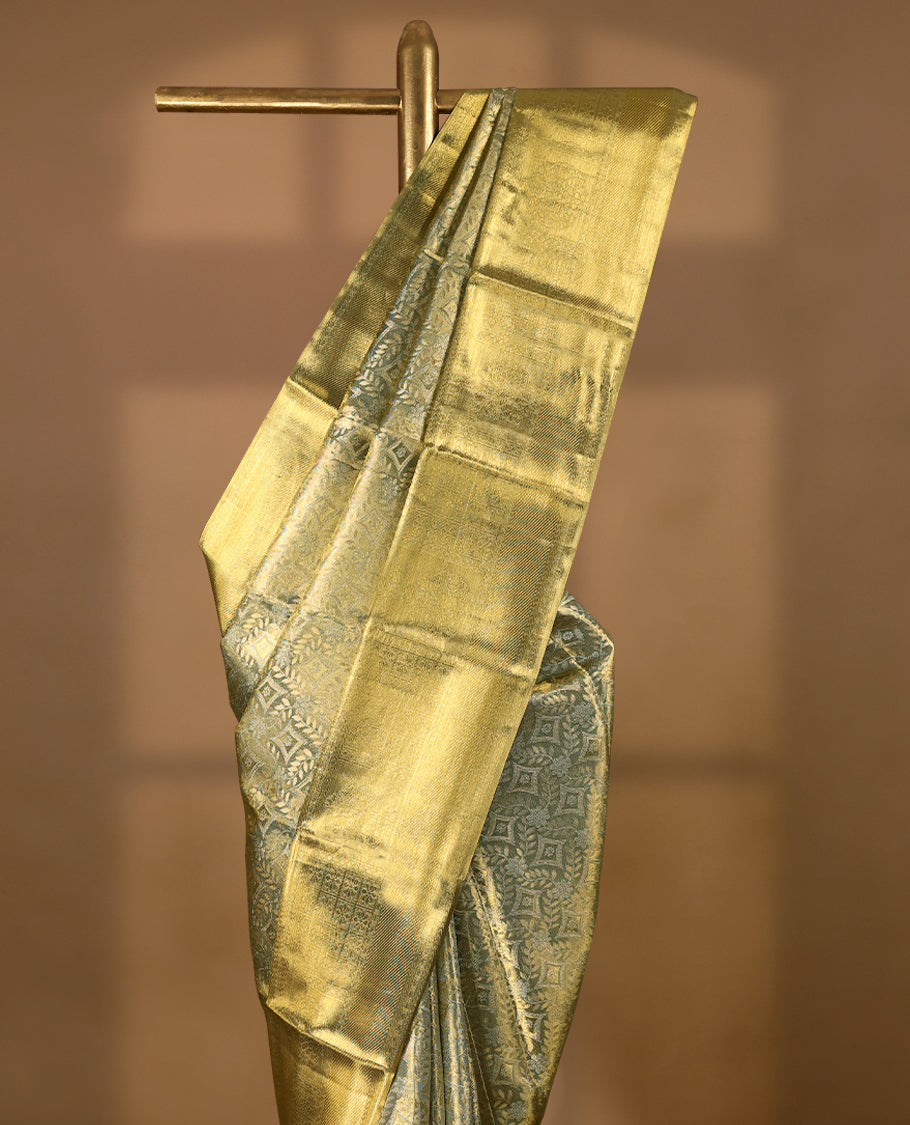 Light Golden Colour Kancheepuram Tissue Silk Saree having Self Coloured Zari Worked Body with Brocade Border and Blouse