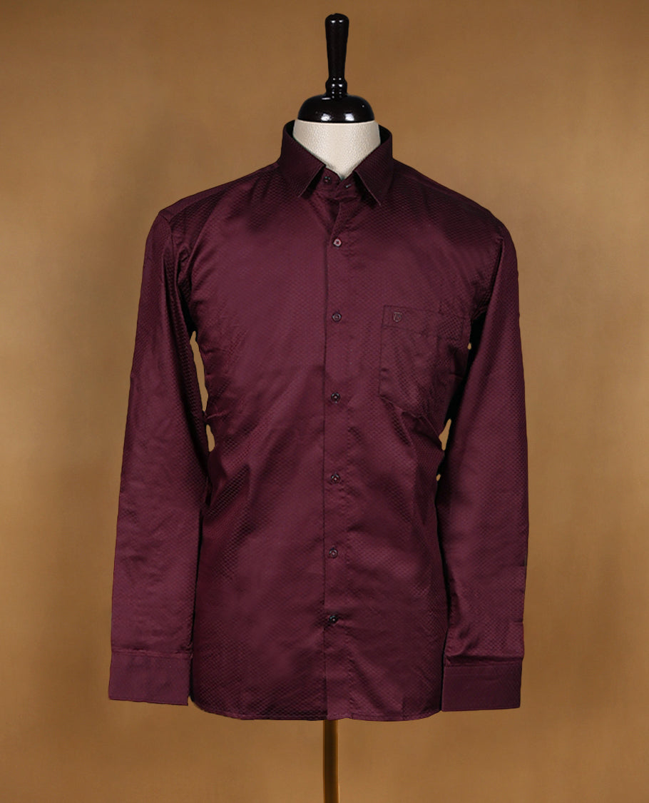 Maroon colour OTTO men’s shirt in a relaxed formal fit, featuring a subtle dotted self design texture, full sleeves, classic collar, and chest pocket ideal for both office and evening wear.