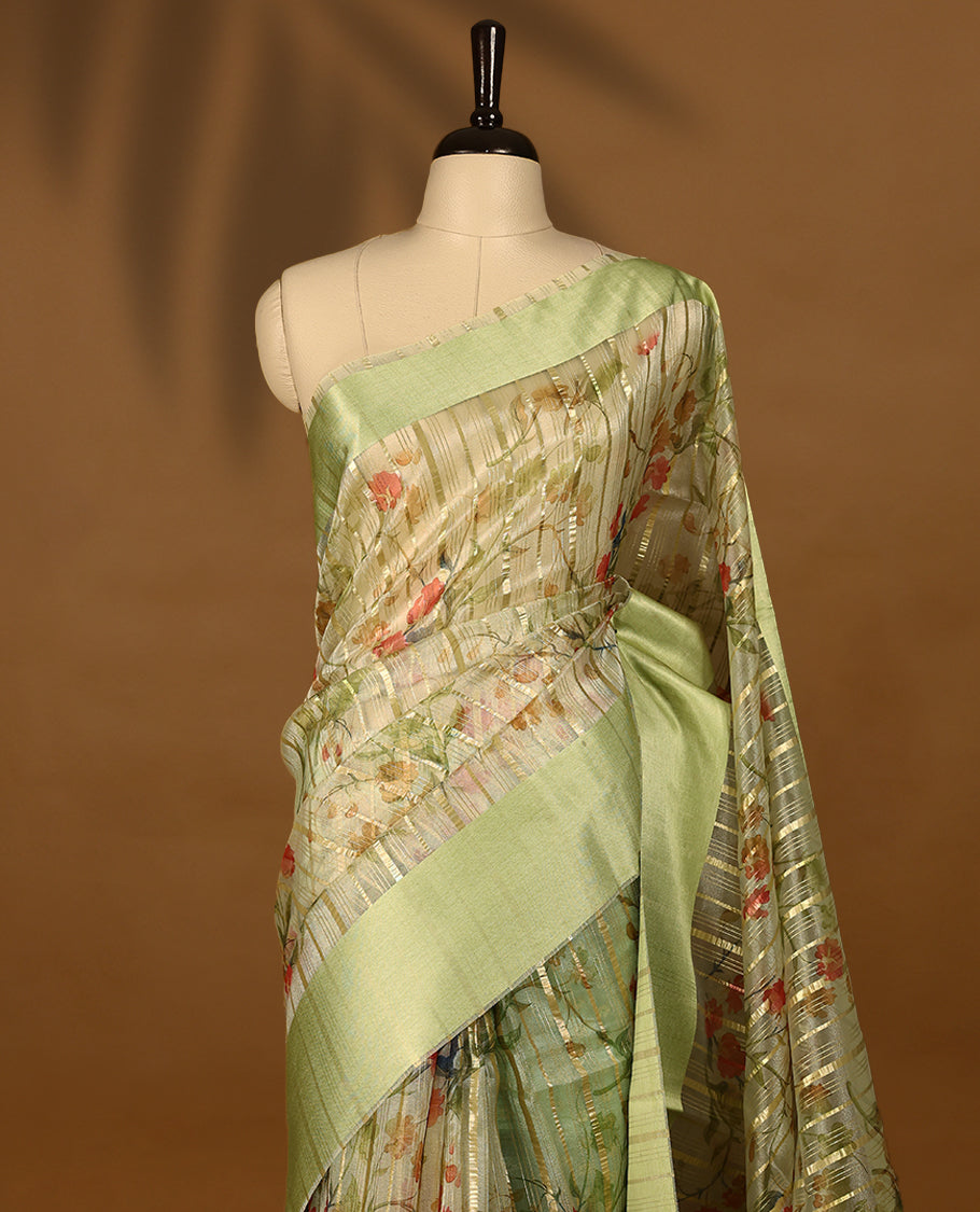 Pista semi-organza saree with intricate floral jaal work, elegant border, and a matching silk brocade blouse.