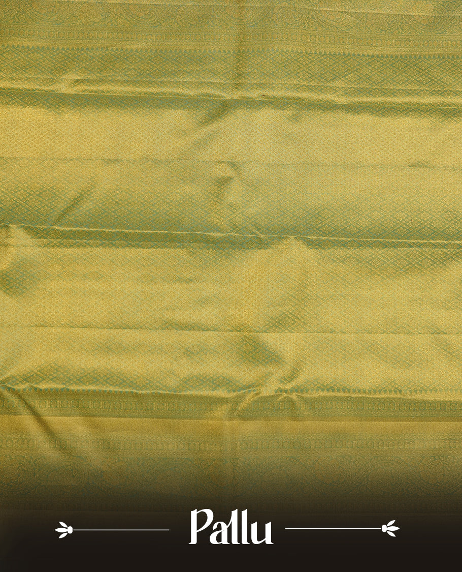 Light pastel green & gold double shade colour kancheepuram tissue silk saree highlighting gold zari pattern body, with contrast lavender colour colour with traditional border and paired with matching blouse.