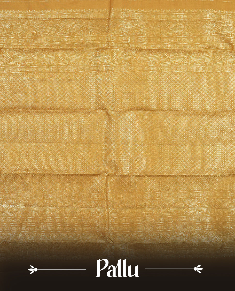 Gold colour Kanchipuram Samudrika Silk Saree featuring patterns weaving with gold zari jacquard and a traditional zari border, paired with a matching designer jacquard blouse piece