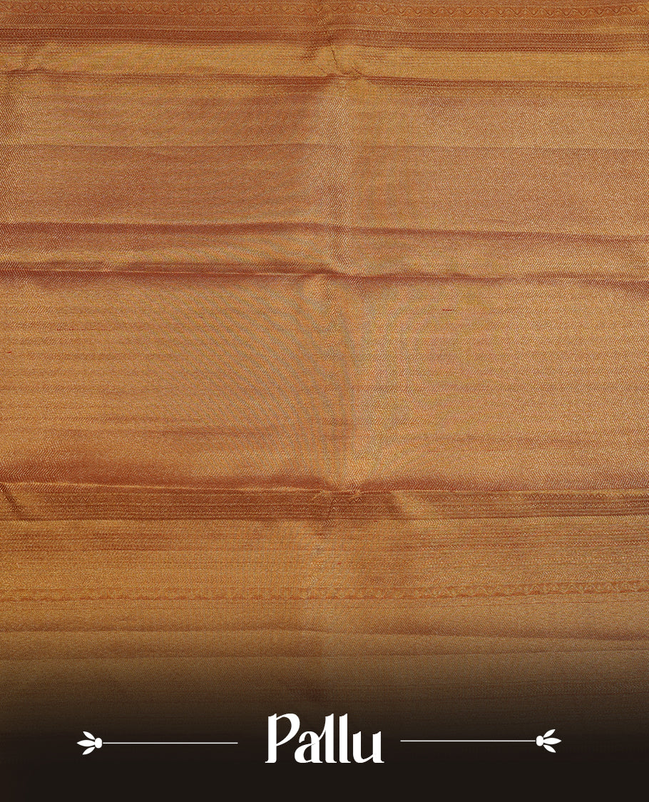 Gold colour kancheepuram tissue silk saree highlighting gold stripped zari pattern body, with contrast Pinkish beige colour colour with traditional border and paired with matching blouse.