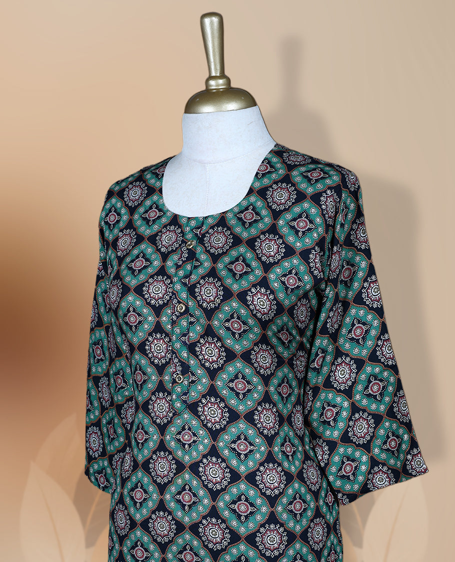 Navy blue colour kurti featuring a round neckline, 3/4th flared sleeves, and an all over geometric floral print in teal and pink hues, designed with a straight cut silhouette for a chic casual look.
