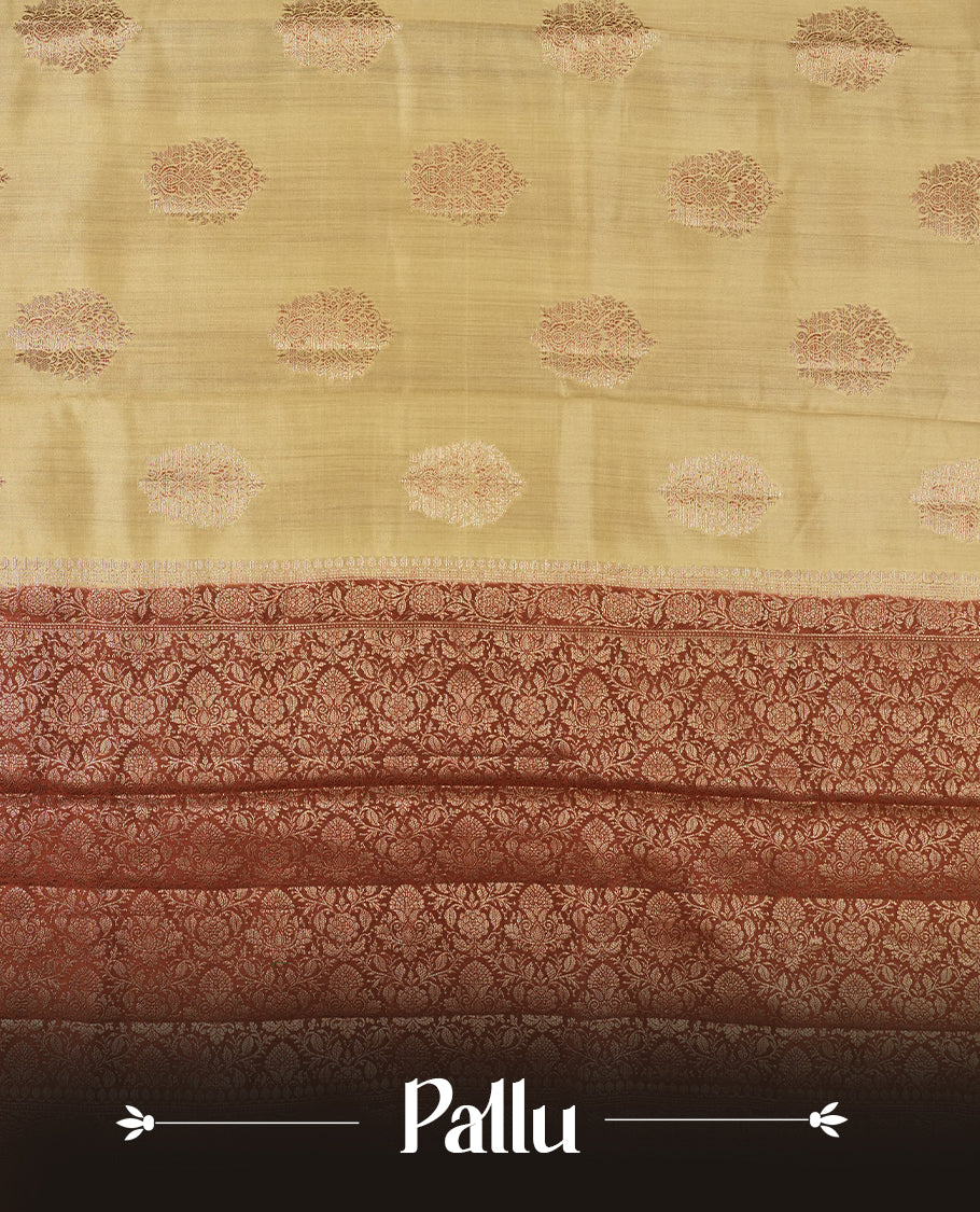 Cream Beige Colour Banaras Soft Silk Saree with Gold Zari Mandala Oval Buttas, Intricate Multi-Layered Floral and Foliate Pallu Border, Grand Pallu with Ornate Peacock Motifs in Burgundy and Gold Tones, and Matching Rust Orange Blouse.