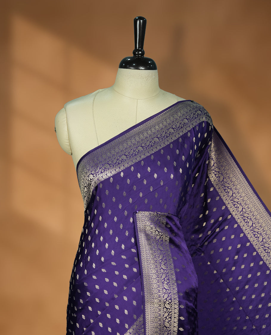 Navy Blue Colour Semi Banarasi Satin Crepe Saree with Silver Zari Buti Motifs, Traditional Gold Ornamental Pallu, Elaborate Woven Border, Decorative Tassels with Matching Blouse