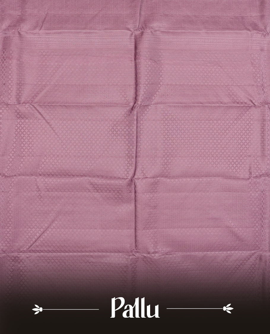 Medium grape colour semi soft silk saree featuring a self coloured textured patterned body, complemented by self coloured Square motifs on pallu & border and a matching blouse piece.