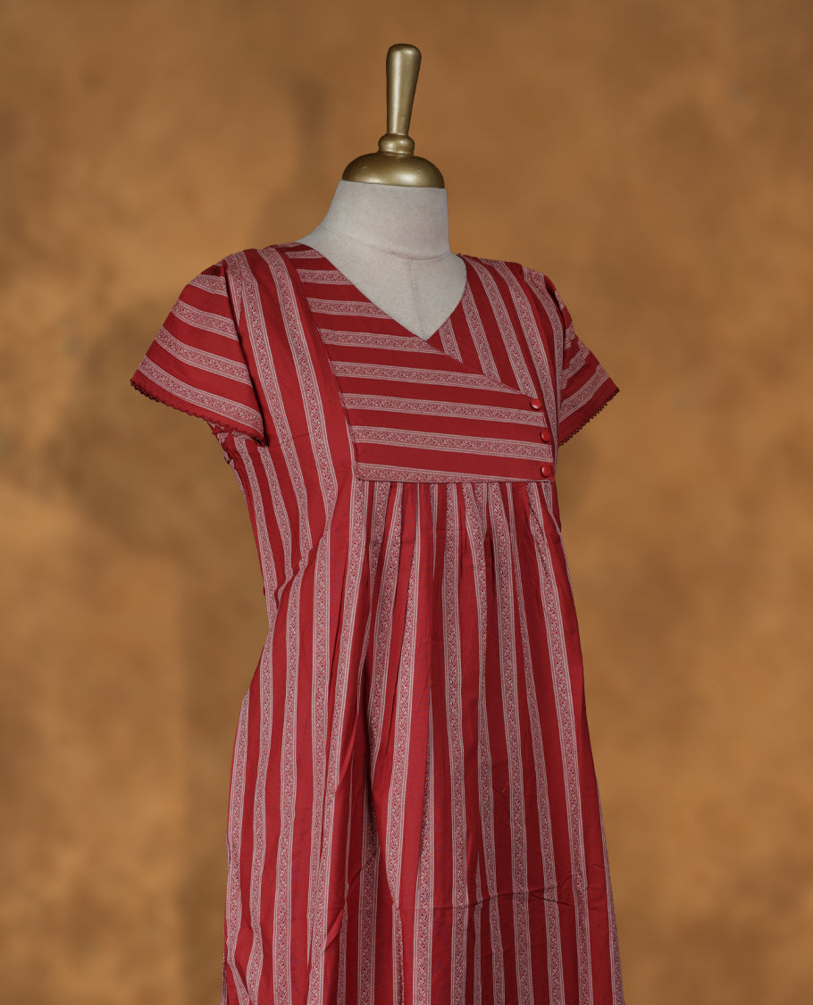 Brick red colour Nstyle nighty with featuring a floral pattern, a V neckline with design pattern, sleeveless, and a full-length