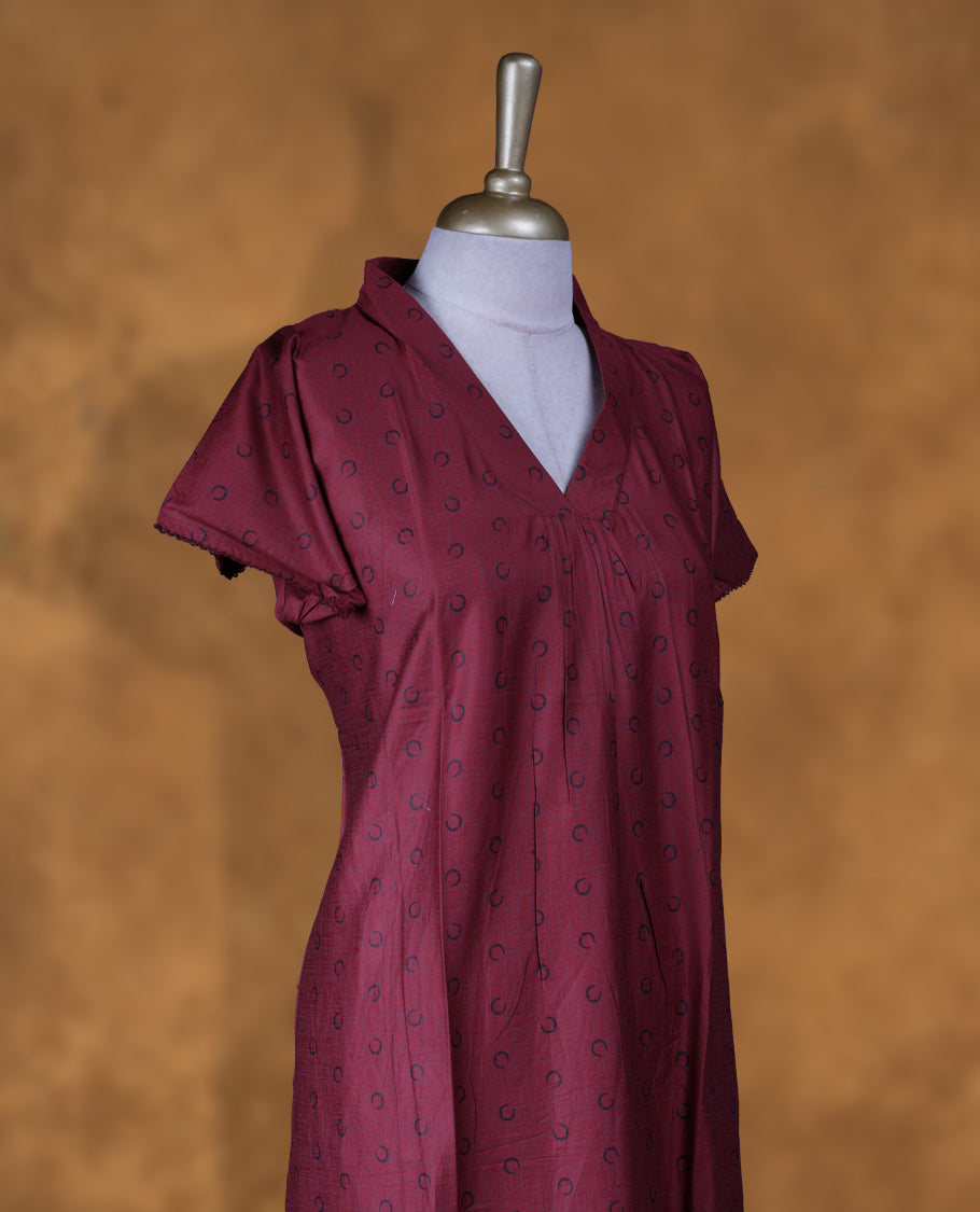 Dark red colour Nstyle nighty with featuring a moon pattern, V-neckline with colar design, short sleeves, and a full-length