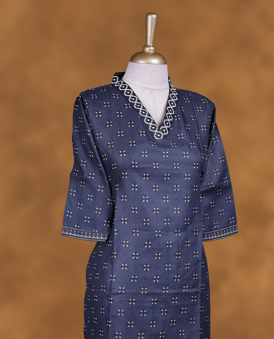 Ash blue colour kurti with styled with a thread pattern around neckline, print on body knee length design, and a sleeve .