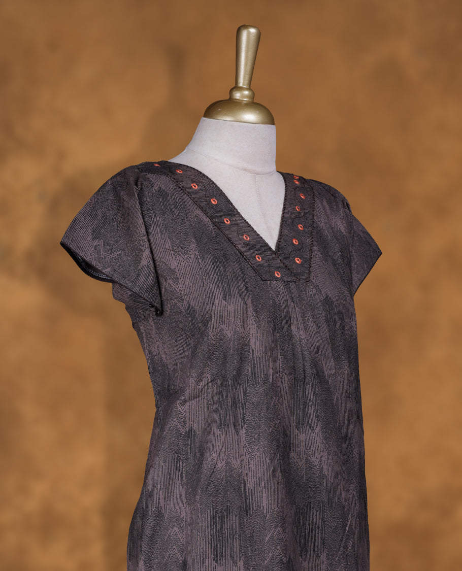brownish gray colour NStyle nighty featuring black patterns, a V-neckline with thread detailing, short sleeves, and a full ankle-length design.