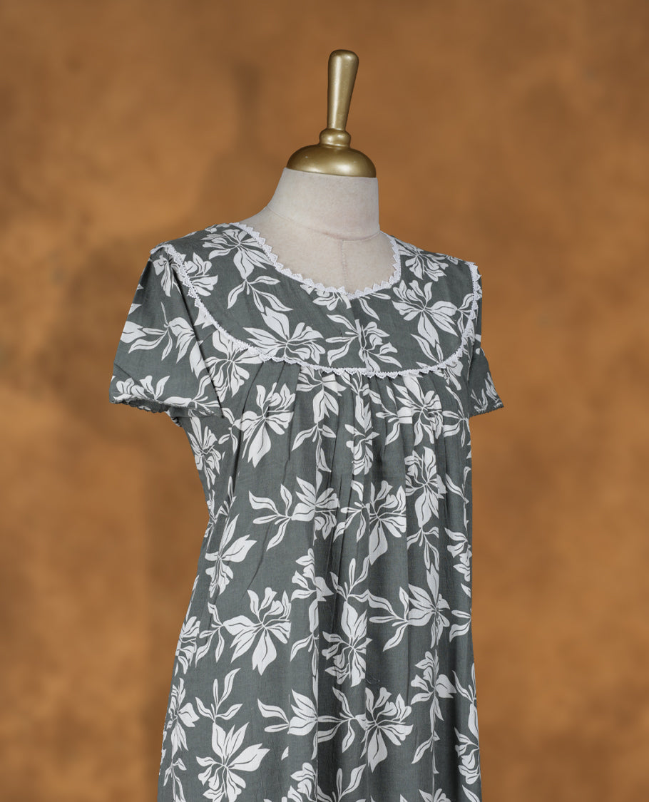 thyme green colour NStyle nighty featuring white colour floral patterns, a Diamond neckline with lace details , short sleeves, and a full ankle-length design.