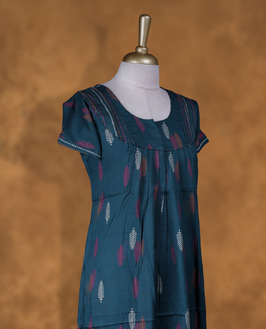 Dark cyan colour NStyle nighty featuring coloured Leaf pattern, a U neckline with pipe details , short sleeves, and a full ankle-length design.