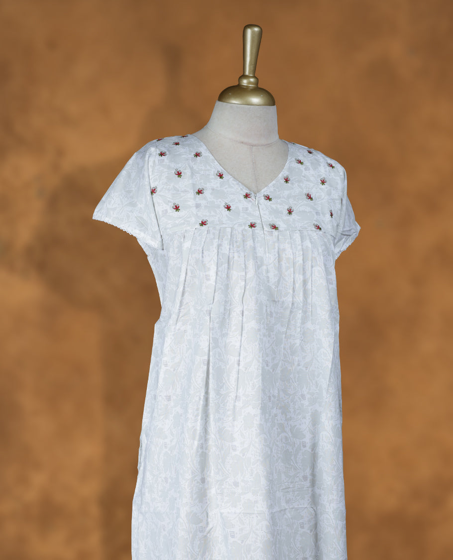 Off White colour NStyle nighty featuring greenish white floral patterns, a V-neckline, short sleeves, and a full ankle-length design.