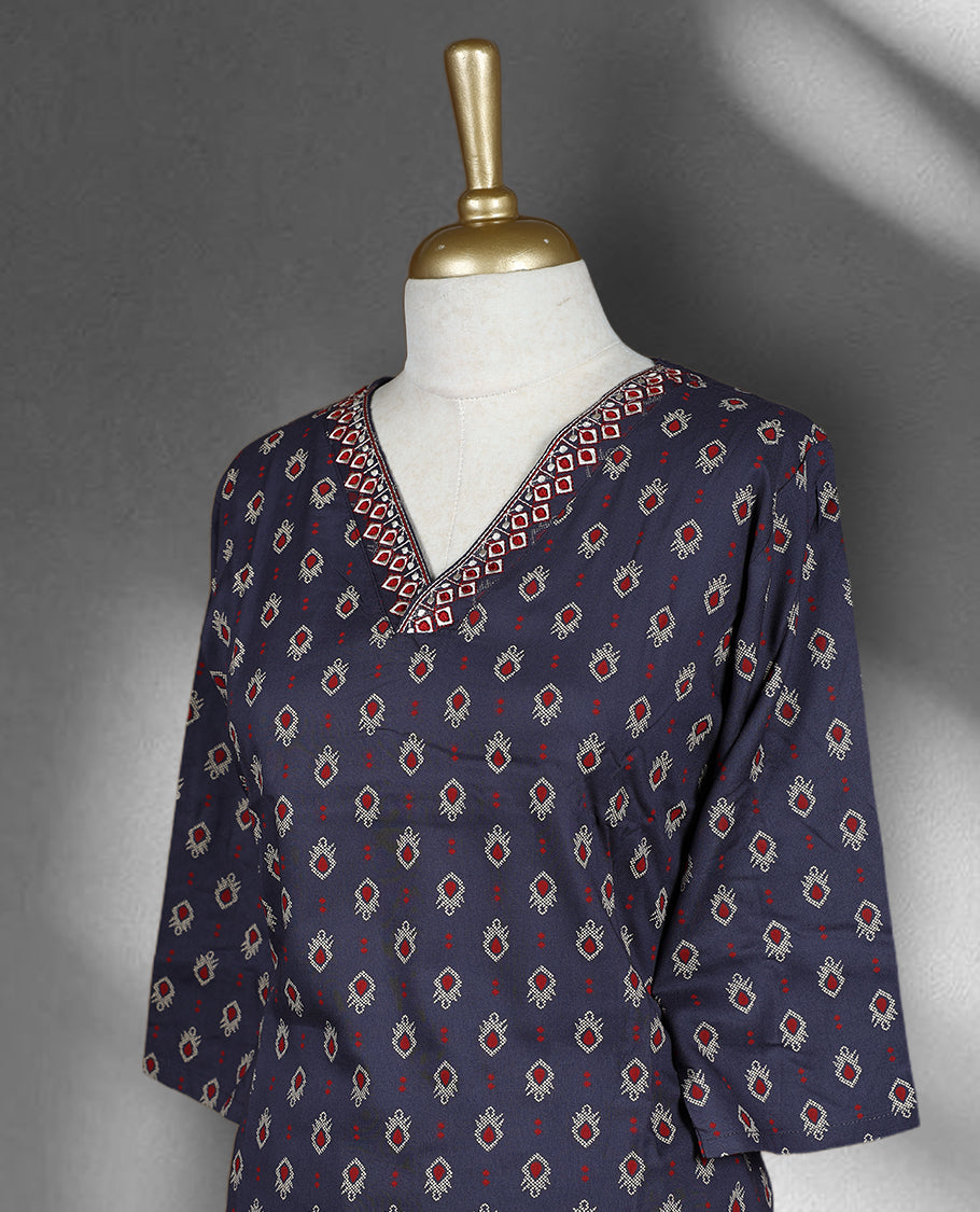 Navy blue colour cord set with all over traditional motifs, featuring a V neck top with embroidered detailing and matching straight fit pants.