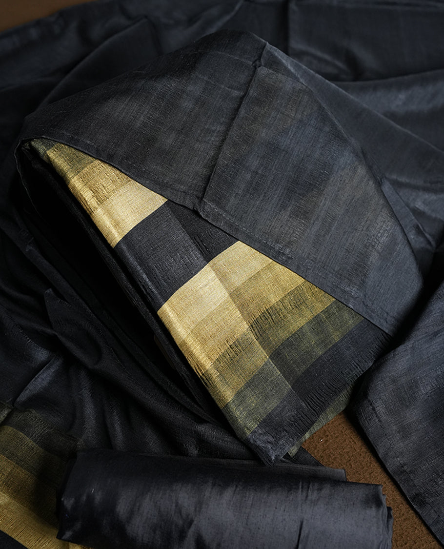 Black colour churidhar material featuring elegant horizontal stripes on the yoke and dupatta, woven in shades of Green and Black & Paired with a matching plain bottom