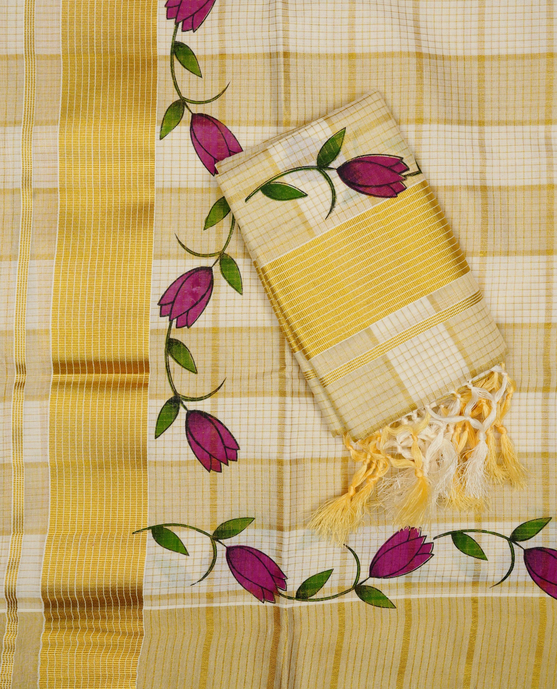 Cream colour cotton Set Mundu With Gold zari checks on body, enhanced with Gold zari & Floral printed kara.