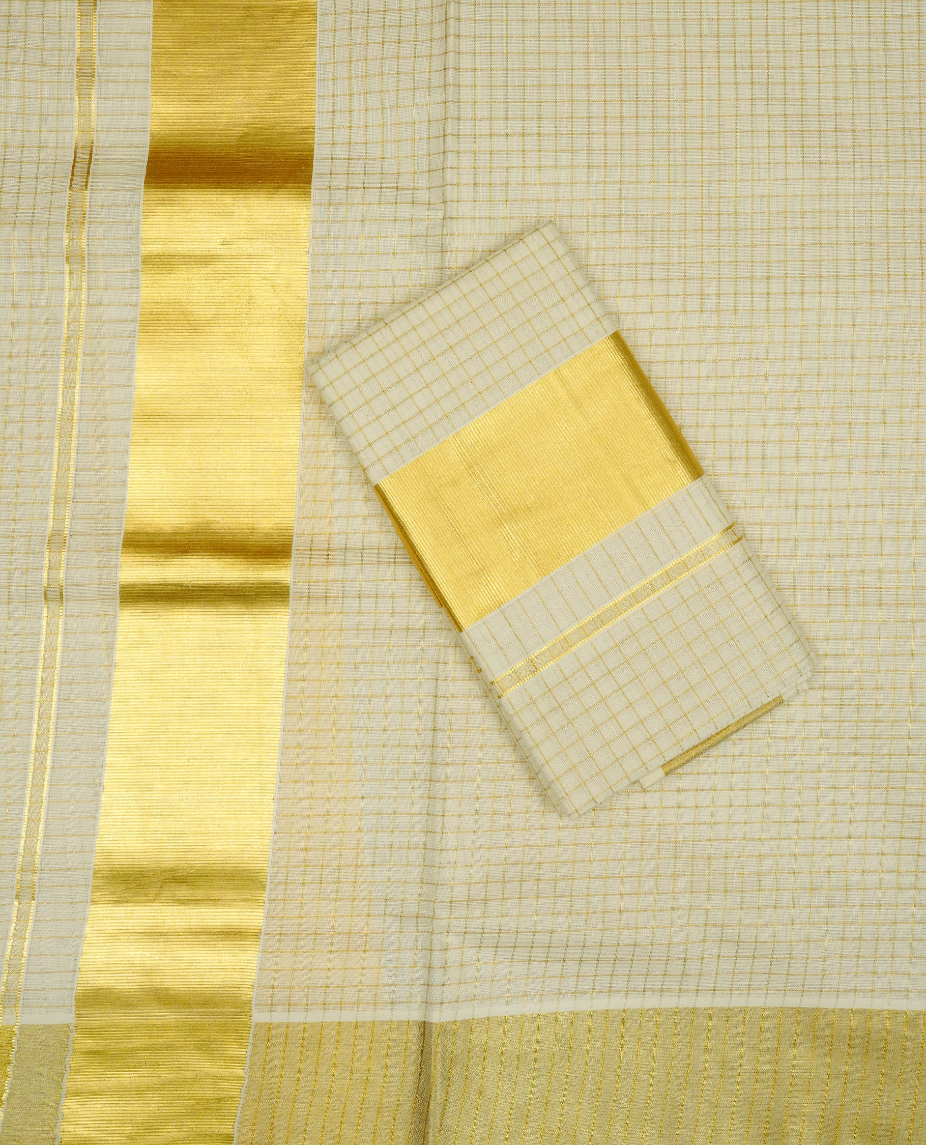 Cream colour cotton Set Mundu With gold zari check body, enhanced with Gold kasavu kara.