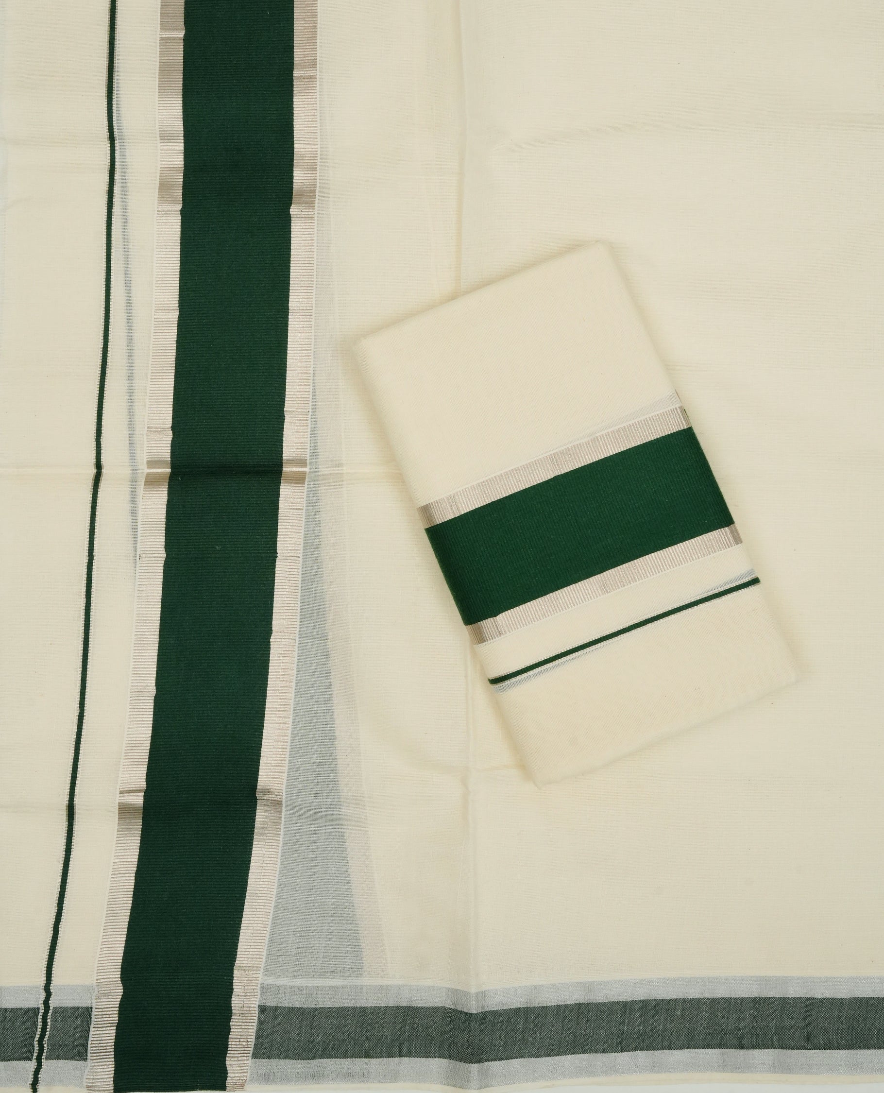 Cream colour Cotton set mundu With plain body, enhance Silver zari with Dark green kara.