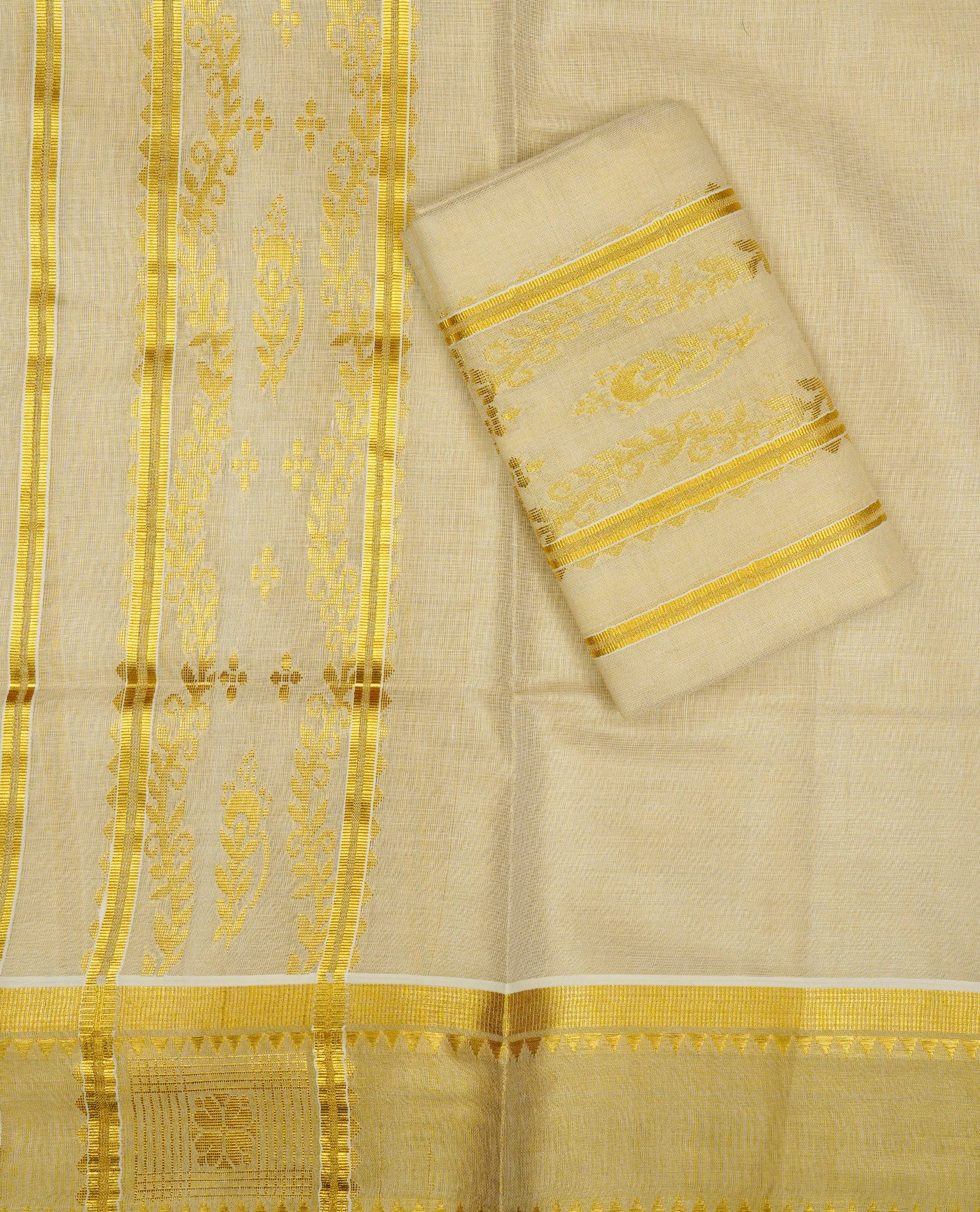 Cream tissue set mundu featuring a Plain body, enhanced with intricate gold zari detailing on the kara
