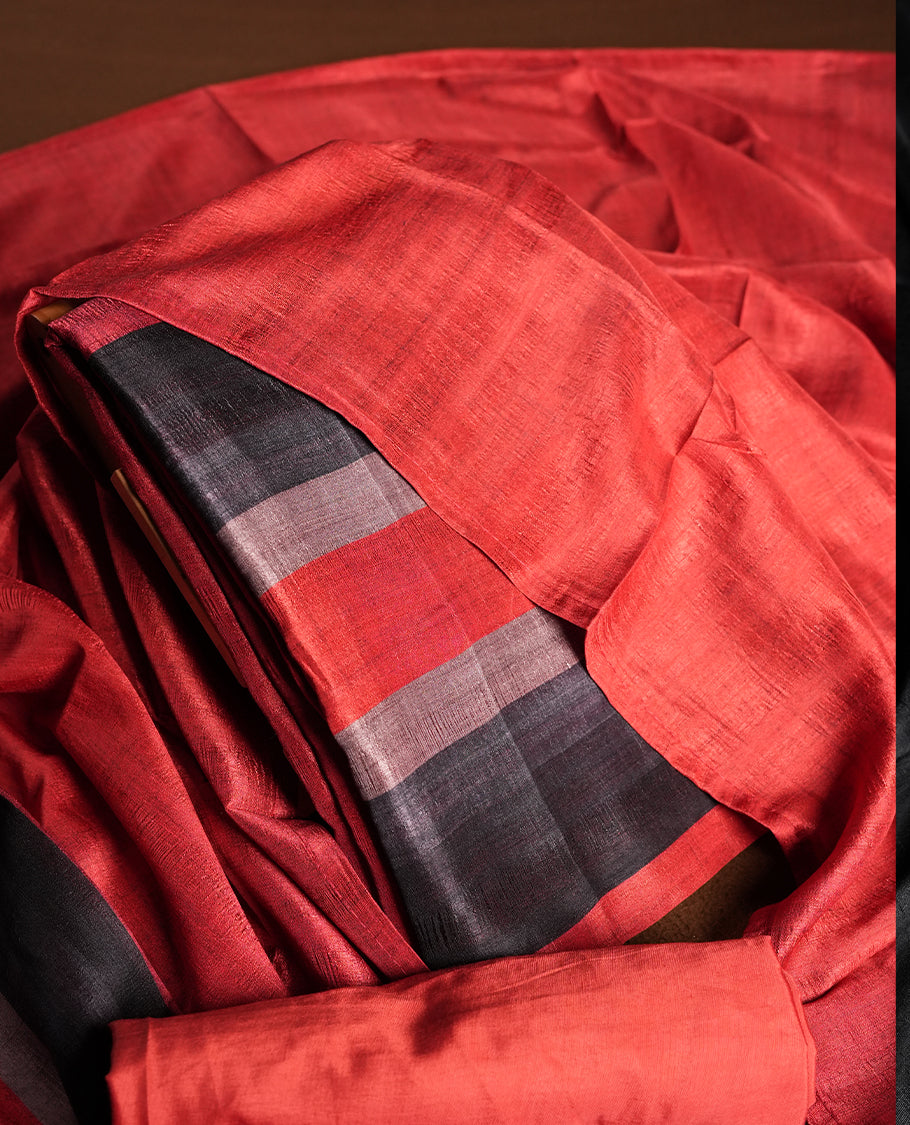 Red colour churidhar material featuring elegant horizontal stripes on the yoke and dupatta, woven in shades of Black and Red & Paired with a matching plain bottom